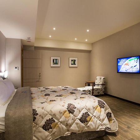 Verygood Business Hotel Huatan Quarto foto