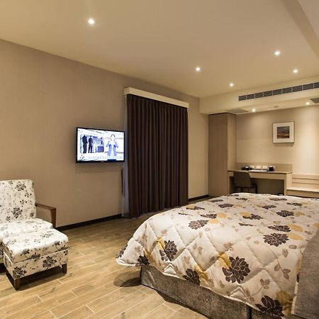 Verygood Business Hotel Huatan Quarto foto