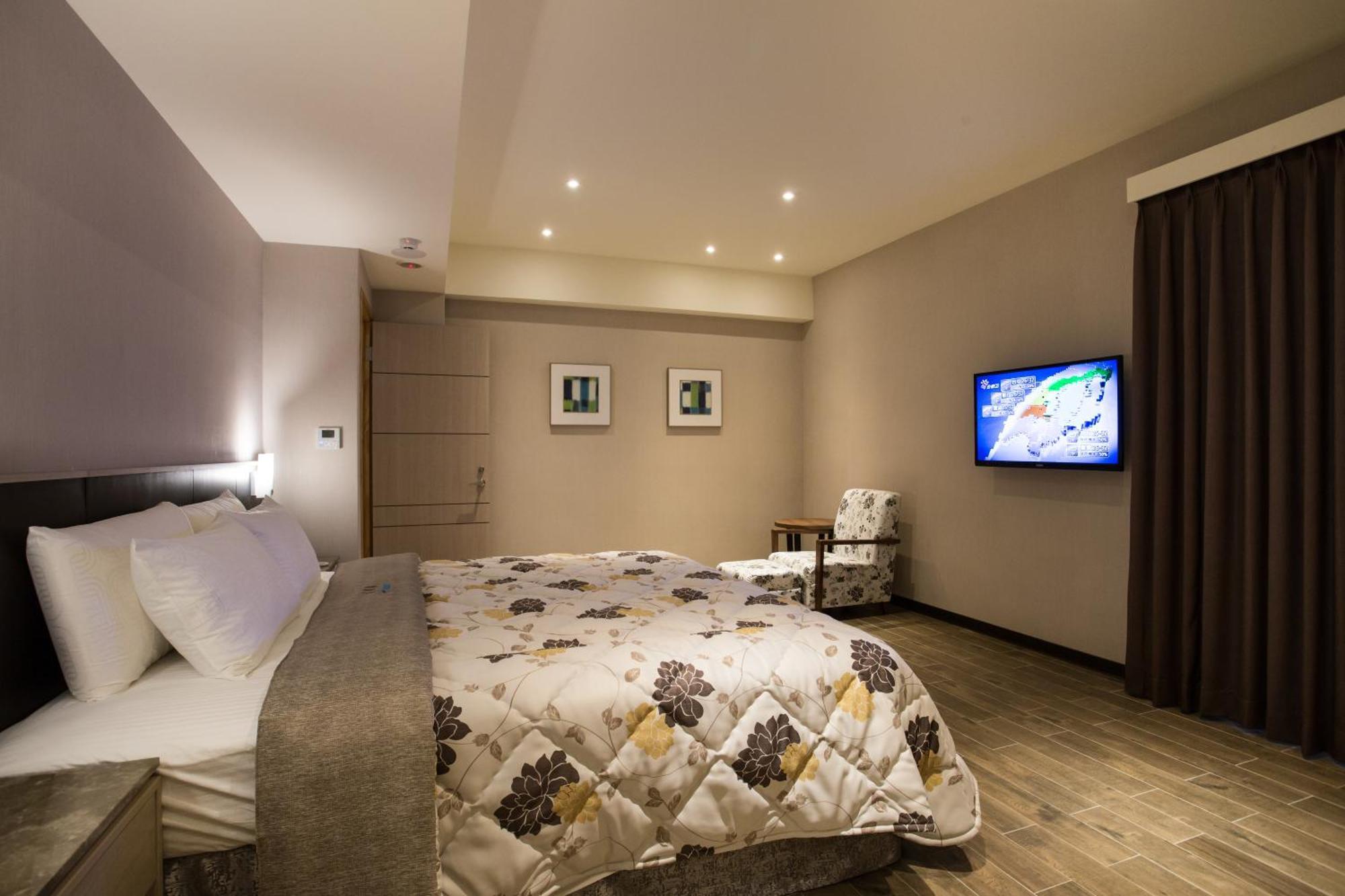 Verygood Business Hotel Huatan Quarto foto