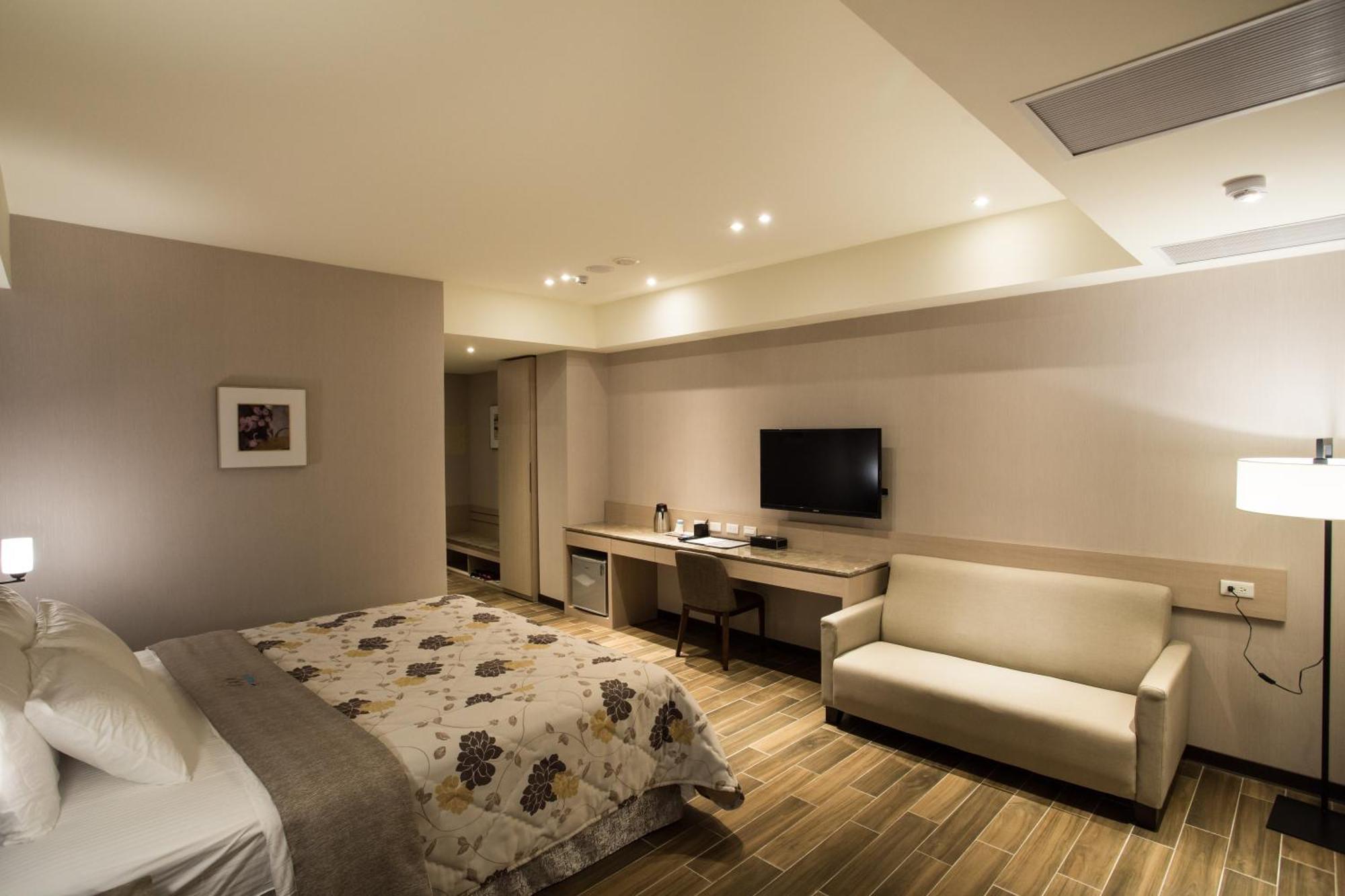 Verygood Business Hotel Huatan Quarto foto