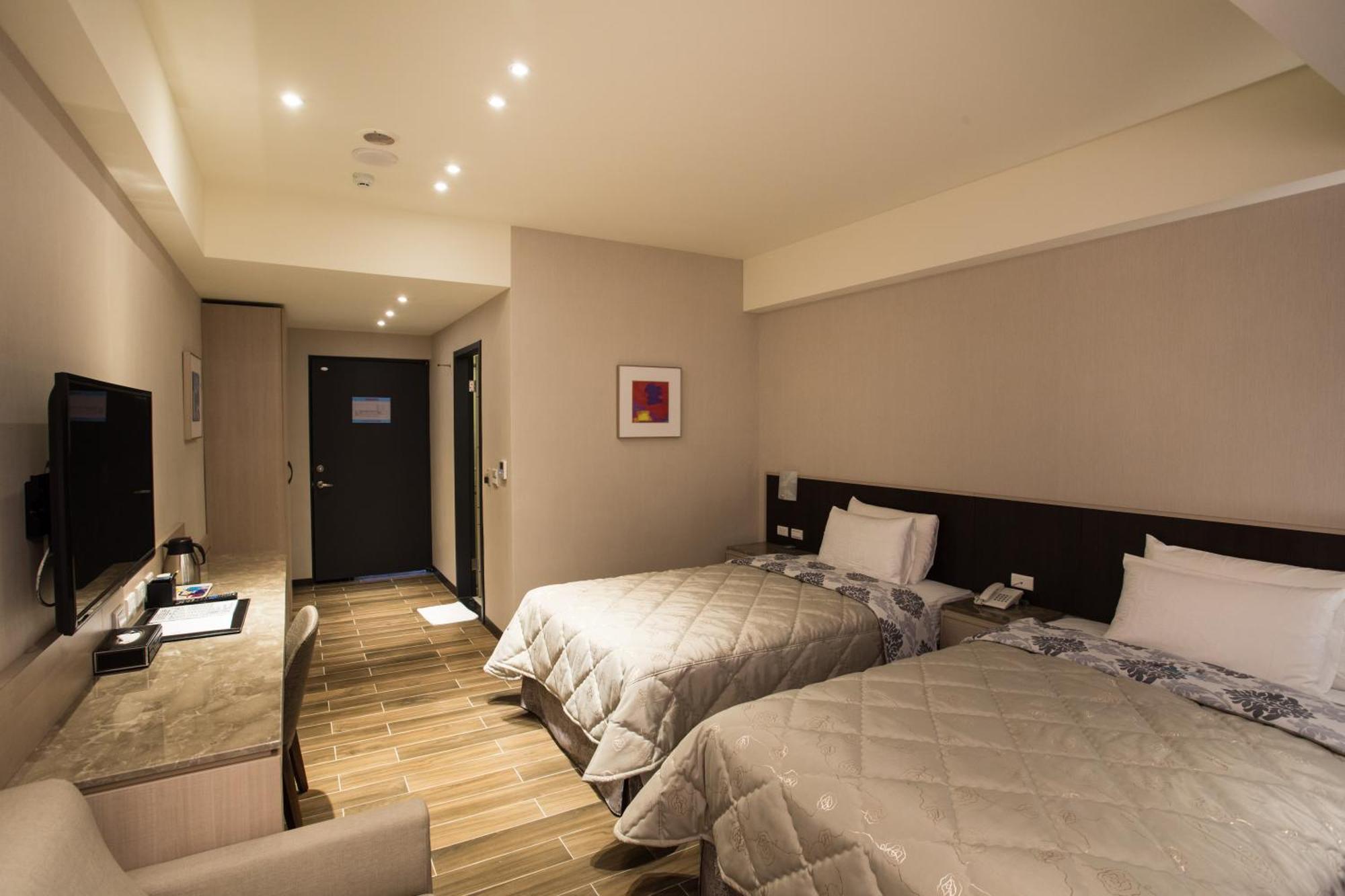 Verygood Business Hotel Huatan Quarto foto