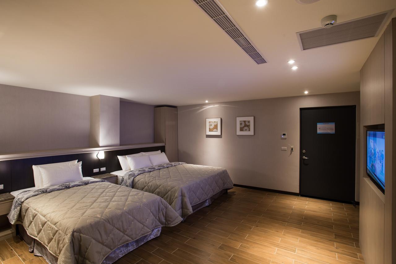 Verygood Business Hotel Huatan Quarto foto